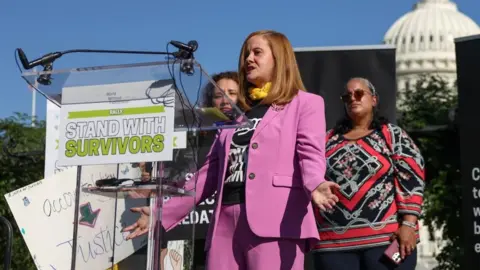 Epstein survivor Liz Stein speaks at a 2025 rally on Capitol Hill in Washington, DC. Reuters photo.