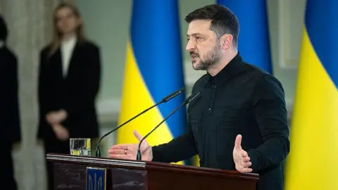 Volodymyr Zelensky speaks in Kyiv on Dec. 22, 2025, outlining elements of a revised 20-point peace plan.