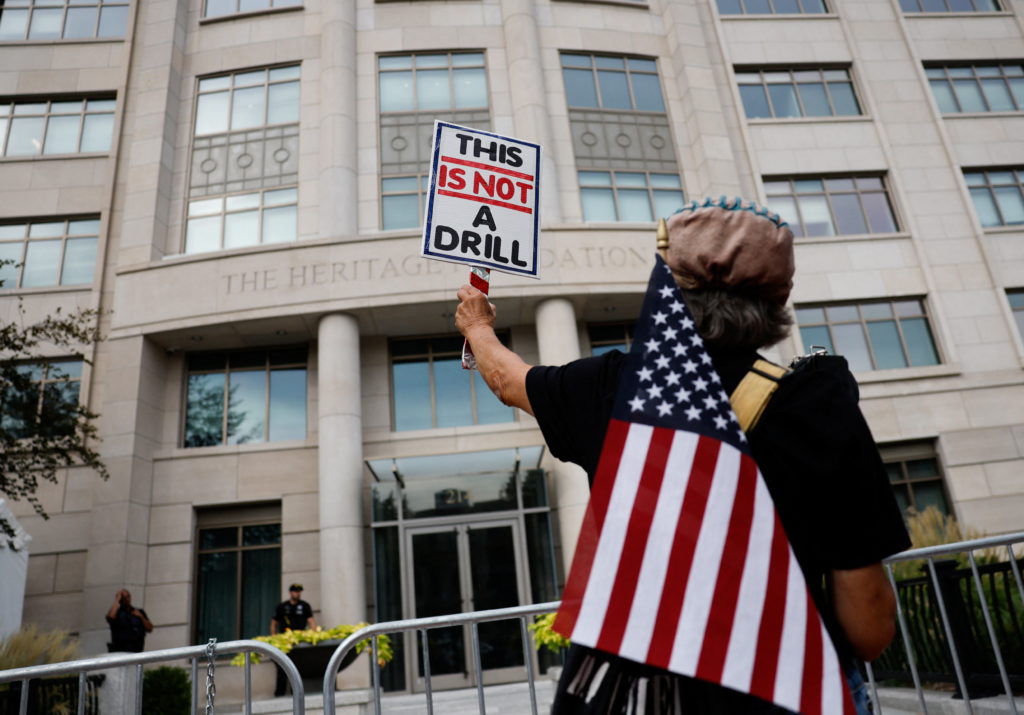 People protest outside the Heritage Foundation in Washington