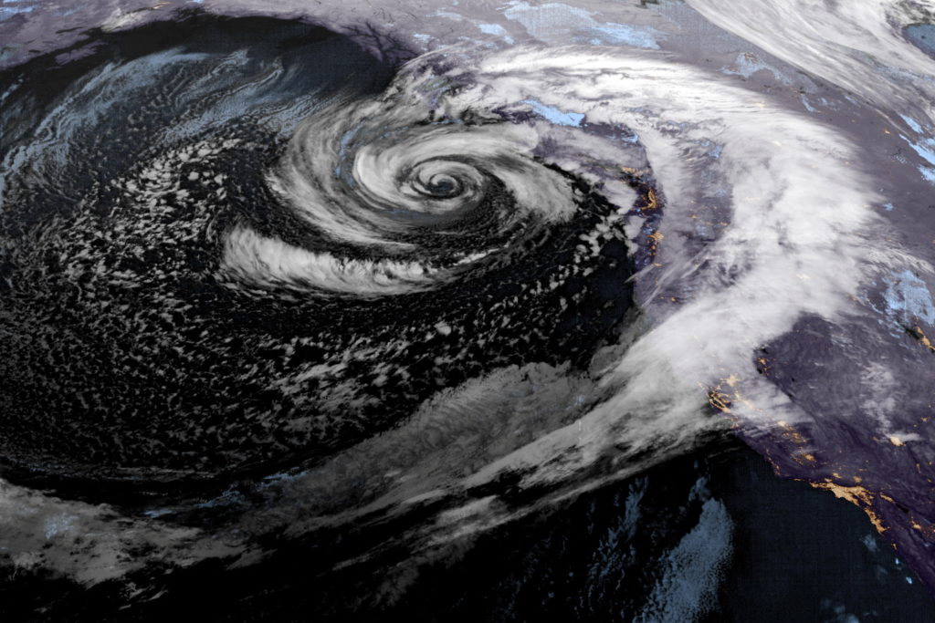 A low-pressure storm system known as a bomb cyclone off the Pacific Northwest and western Canada