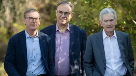 Tiff Macklem, Andrew Bailey, and Jerome Powell at the Jackson Hole Economic Policy Symposium, Aug. 23, 2024 (Getty Images)