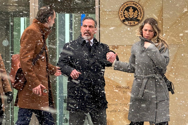 Former DEA agent Joseph Bongiovanni leaves federal court with his wife after his sentencing in Buffalo, N.Y., Jan. 21, 2026. Photo by Jim Mustian / AP.