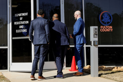 FBI agents execute a search warrant at Fulton County, Georgia's elections office during a 2020 election probe.