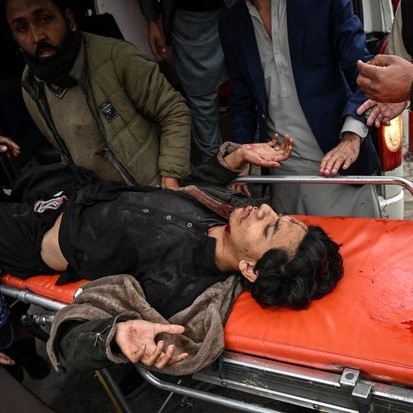 People move an injured man onto a gurney after an explosion at a mosque in Islamabad, Pakistan, Feb. 6, 2026. - cbs