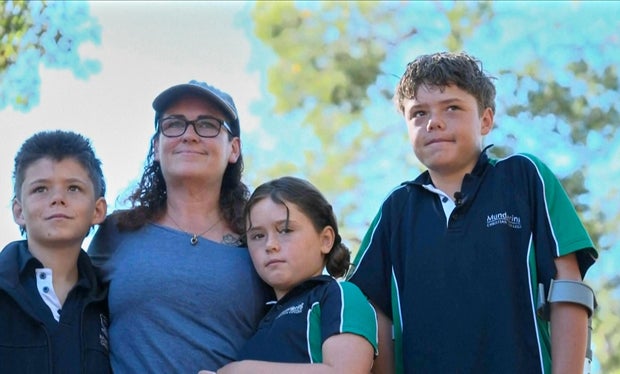 Austin Appelbee poses with his family in Gidgegannup, Australia, Feb. 3, 2026.