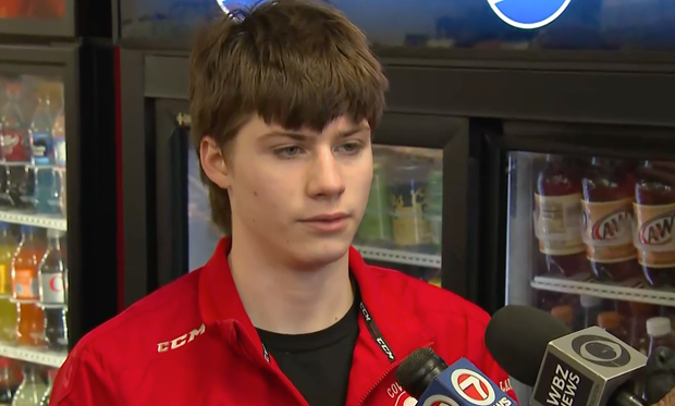 Coventry Public Schools hockey player Olin Lawrence speaks to reporters following the shooting
