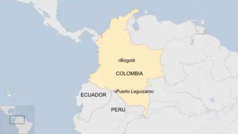 Locator map highlighting Puerto Leguizamo near Colombia's border with Peru, alongside Colombia, Ecuador, and Peru.