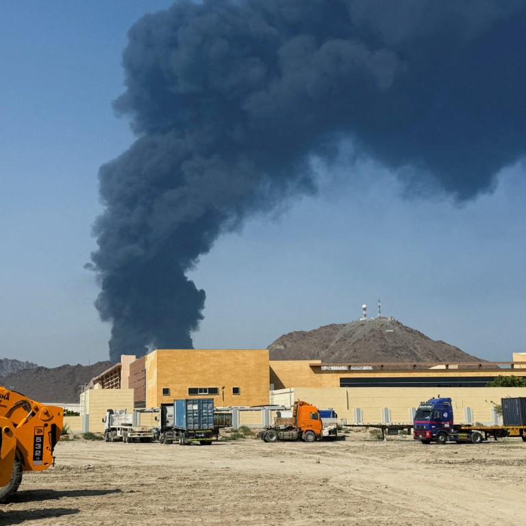 FILE PHOTO: Smoke rises in the Fujairah oil industry zone, caused by debris after interception of a drone by air defenses, according to the Fujairah media office, amid the U.S.-Israel conflict with Iran, in Fujairah, United Arab Emirates, March 14, 2026. Picture taken with a mobile phone. File photo by Staff/Reuters - Staff/Reuters