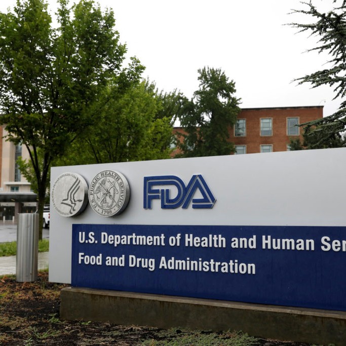 Left: FILE PHOTO: Signage is seen outside of the Food and Drug Administration (FDA) headquarters in White Oak, Maryland, U.S., August 29, 2020. REUTERS/Andrew Kelly/File Photo - Reuters