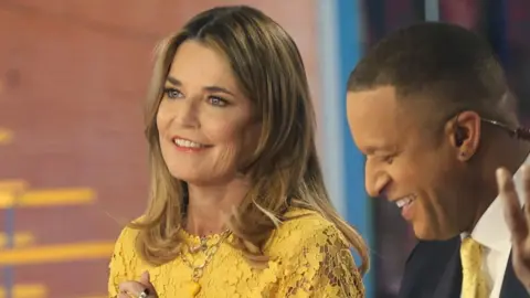 Savannah Guthrie returns to the Today show wearing a yellow dress