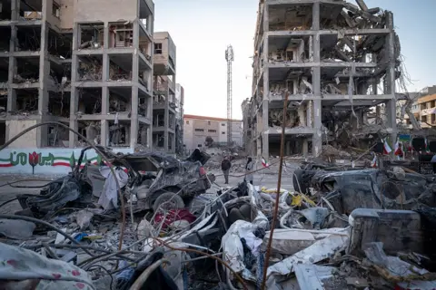 Tehran street damage following US-Israeli operations, April 9, 2026