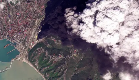 Satellite image showing smoke over the Tuapse oil refinery in Russia after a strike
