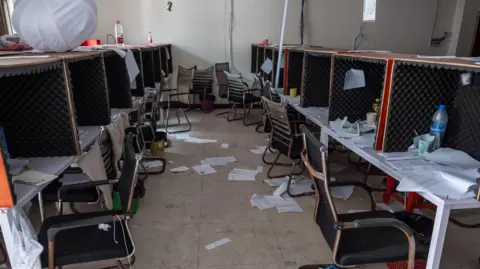 The booths from where the scammers called their targets - BBC