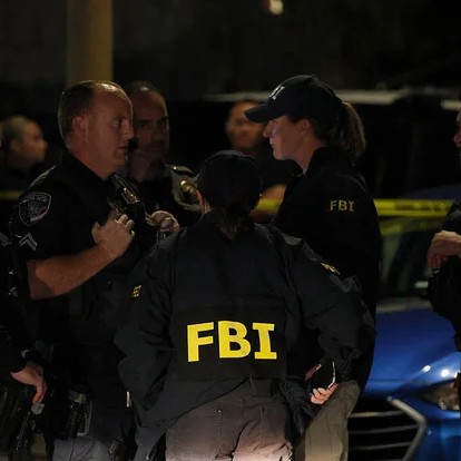 FBI agents are seen outside the home of the alleged White House Correspondents' Dinner shooting suspect in Torrance, California, on April 25, 2026. - Patrick T. Fallon /AFP via Getty Images