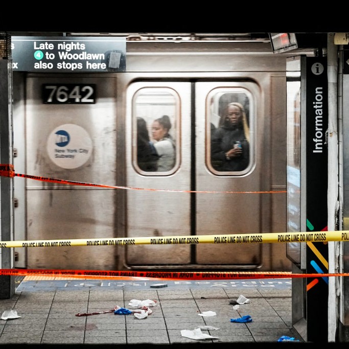 Left: Commuters in a train pass near the crime scene where three people were attacked inside the subway system at Grand Central Station in New York City, U.S., April 11, 2026. - Eduardo Munoz/Reuters
