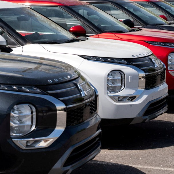 Left: Mitsubishi Outlanders in the parking lot at City Auto Mitsubishi dealership in Murfreesboro, Tennessee, U.S., March 31, 2026. File Photo by Seth Herald/Reuters - Seth Herald/Reuters